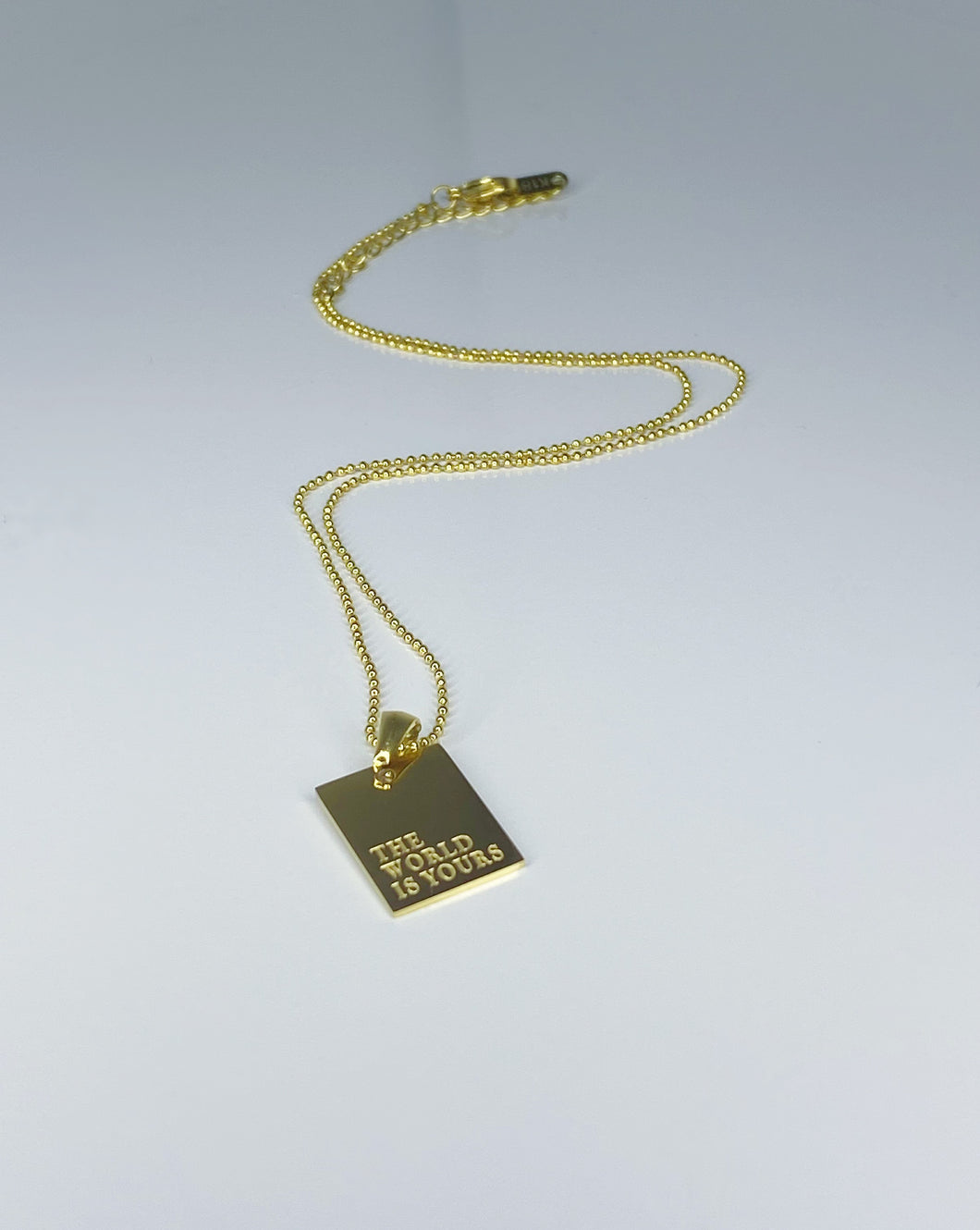 THE WORLD IS YOURS: POSITIVE AFFIRMATION NECKLACE